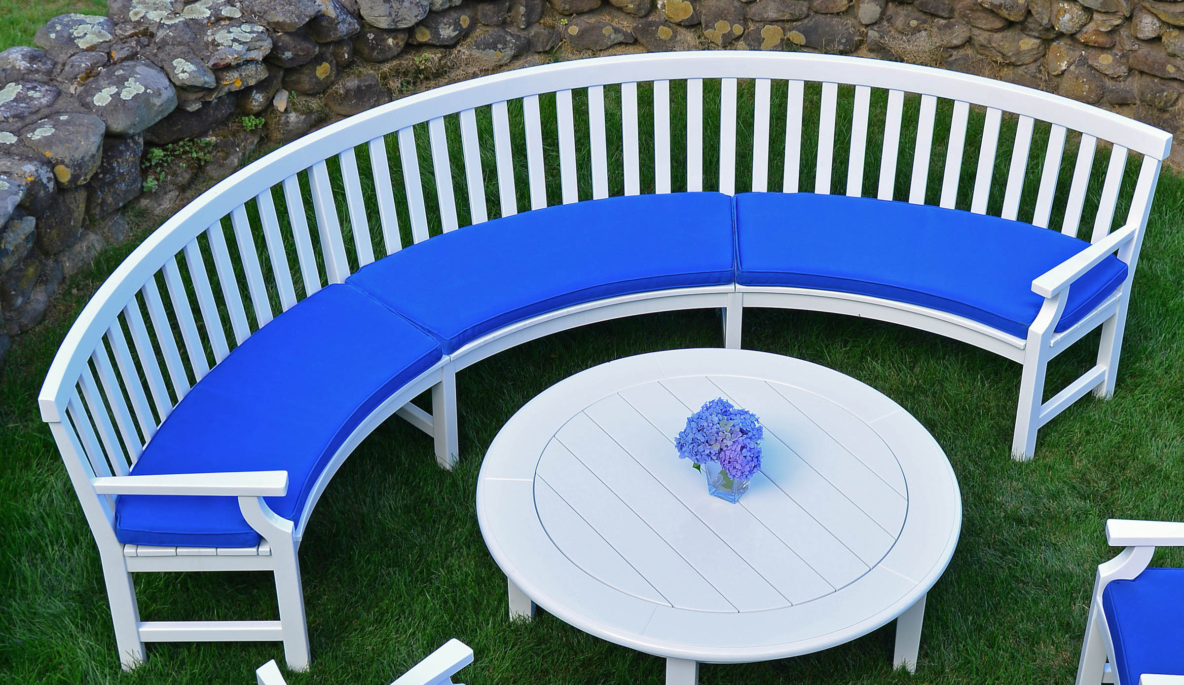 Blue Seat Cushions shown on Weatherend Semicircular Settee